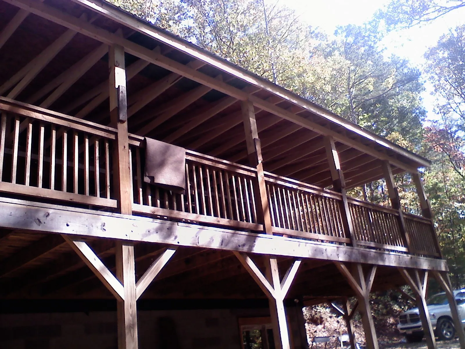 Timber framing under a new elevated porch and deck — Roof Leak Repair in Delton by Roofing Brothers